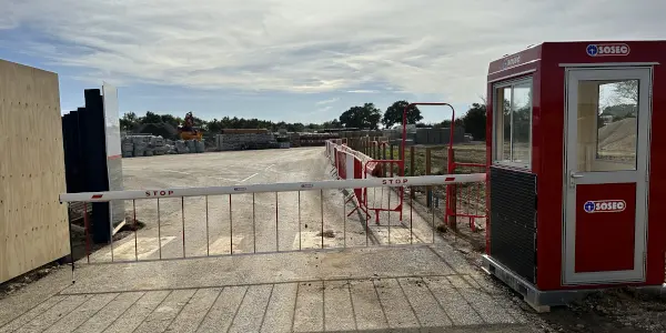 SOSEC 600 on construction site barrier with cab.