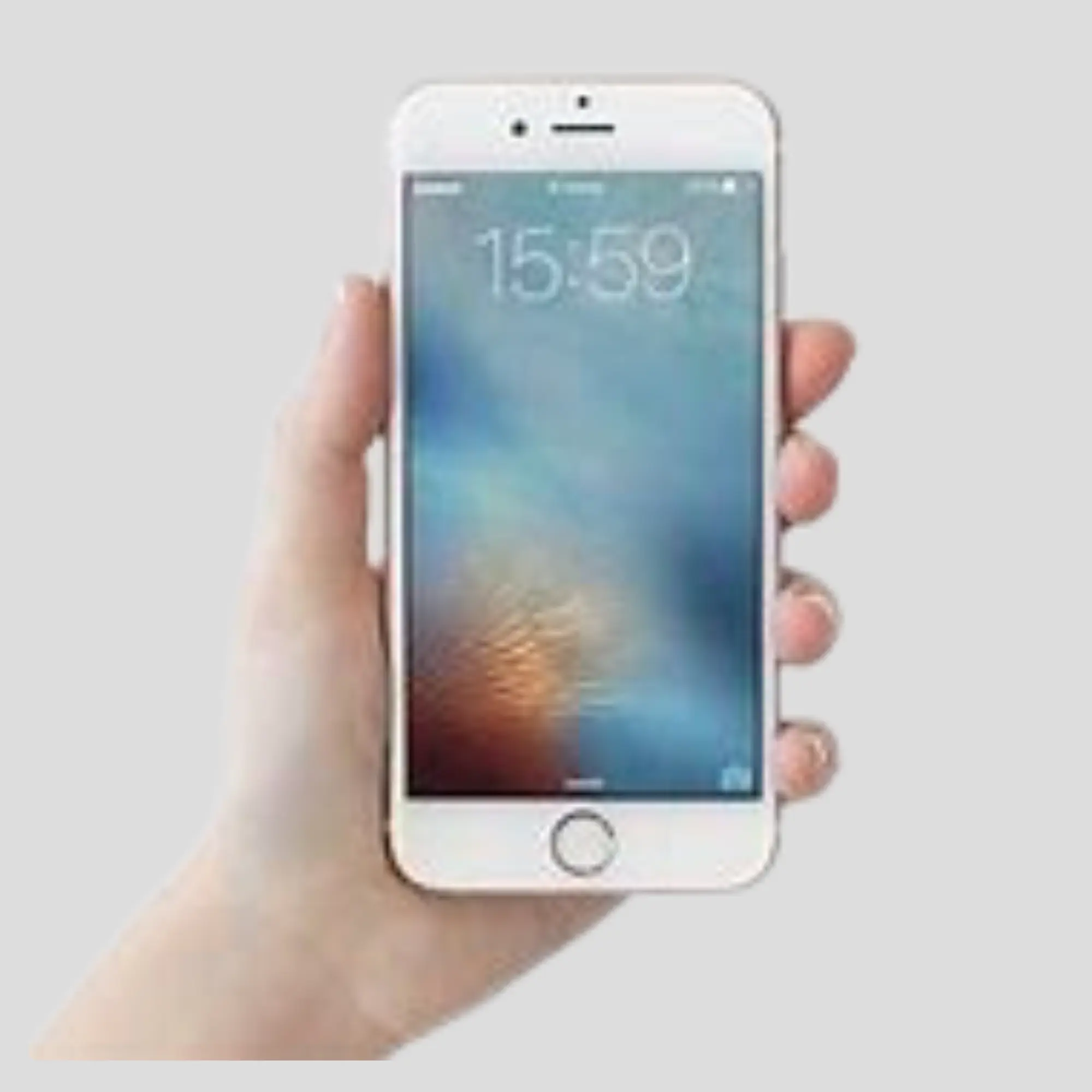 Hand holding mobile device.